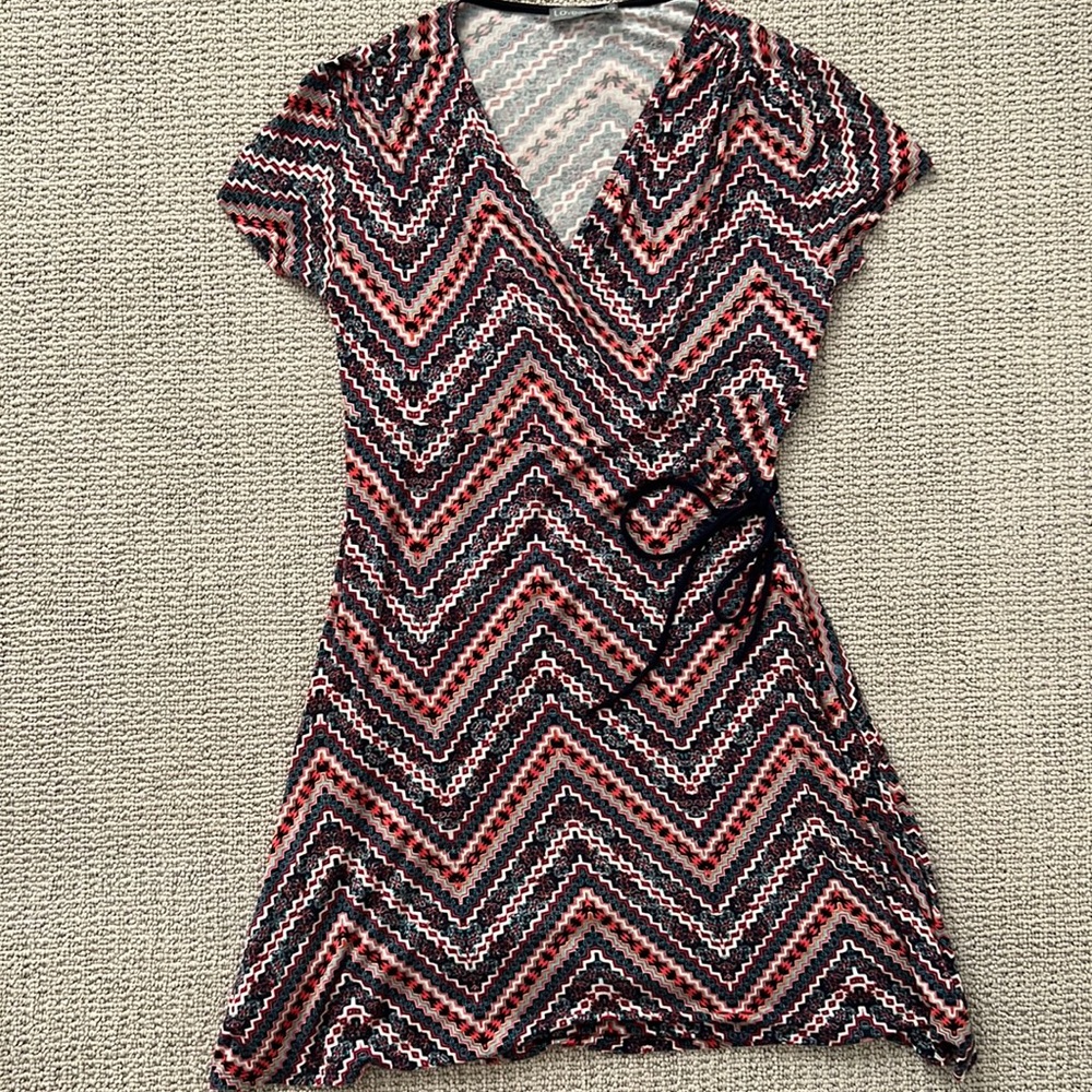 Flattering wrap dress can be worn as maternity.